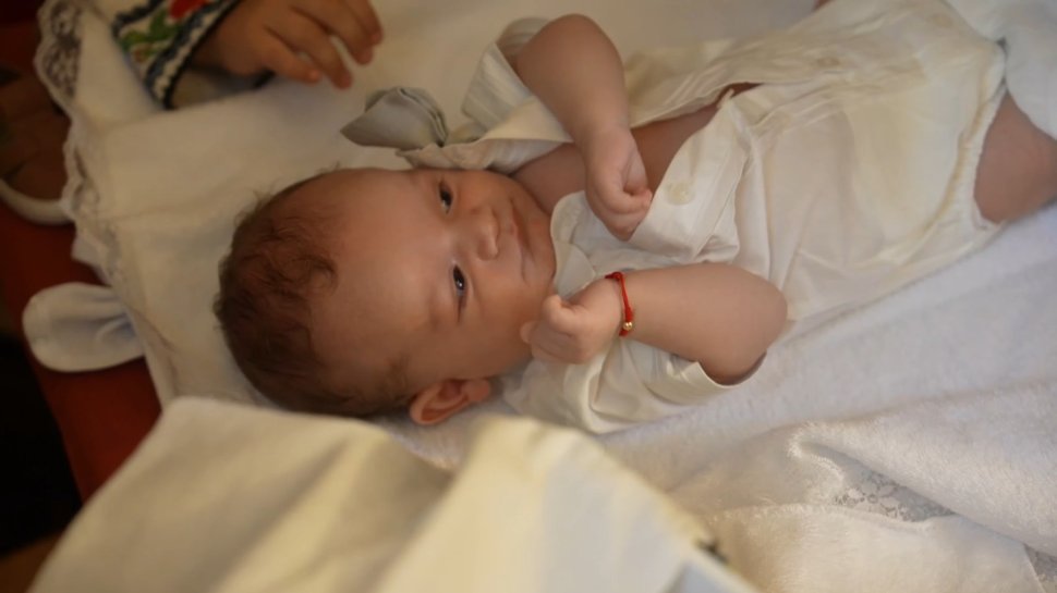 Primul copil al lui George Simion, a fost încreștinat la Rădășeni  1237