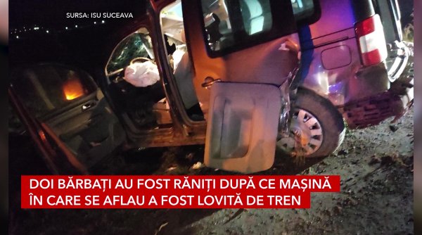doi barbati au fost raniti dupa ce masina in care se aflau a fost lovita de tren